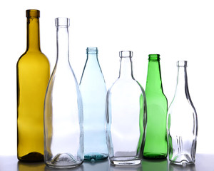 Empty glass bottles isolated on white