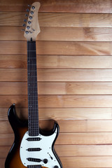 Fototapeta premium Guitar on wooden background