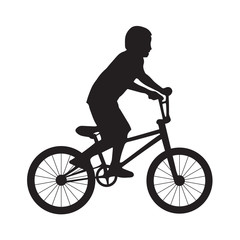 Obraz premium Silhouette boy ride bicycle
