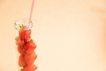 Bottle with strawberry