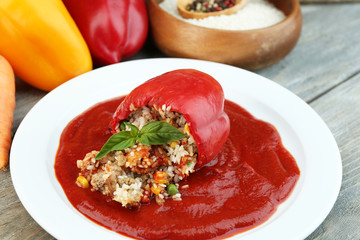 Prepared stuffed pepper with tomato sauce