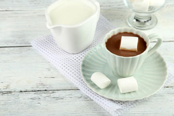 Hot chocolate with marshmallows in mug,