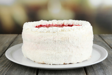 White cake on bright background