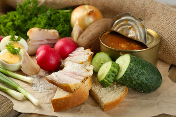 Bacon, fresh vegetables, boiled egg and bread