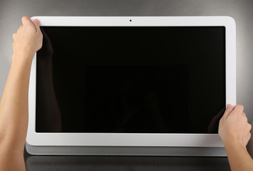 Modern tablet pc on grey background