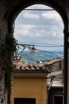 Landscape and sky view through an arch