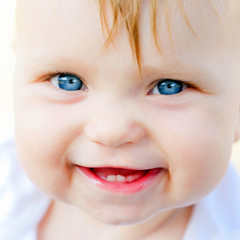 Smiling baby face close-up.