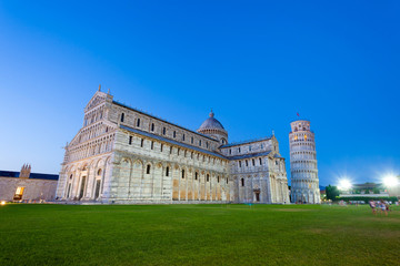 Piazza del Duomo with Pisa tower and the Cathedral illuminated a