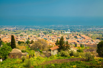 Obraz premium Little town near Etna