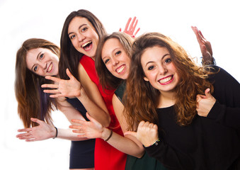  Group of girl friends isolated over a white background 