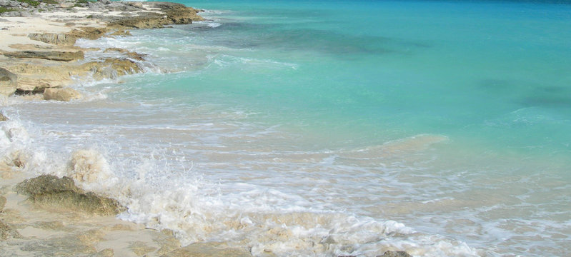Caribbean beach and waves at the Atlantic in Cancun, Mexico