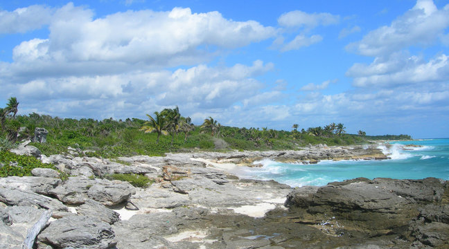Rocky Caribbean beach at the Atlantic in Cancun, Mexico