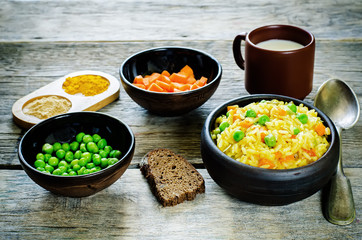 Indian vegetarian pilaf, Biriyani, with carrots and green peas
