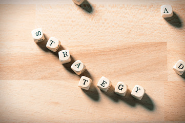 Strategy words on wooden cubes