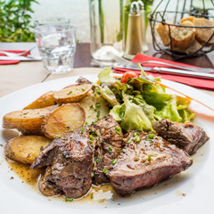 steak beef meat and french fries