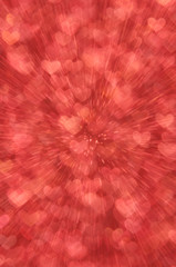 Obraz premium defocused abstract red hearts light background