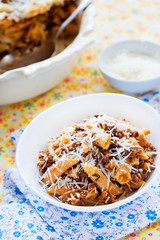 Baked pasta with meat tomato sauce and cheese