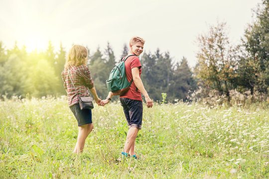 Young couple walks outdoor