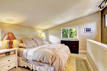 Bedroom interior with vaulted ceiling