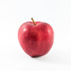 Fresh red apple on a white background