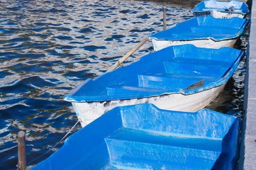 blue boats in the granite city quay