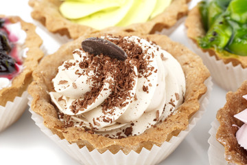 cake with cherry, kiwi fruit, currants and coffee