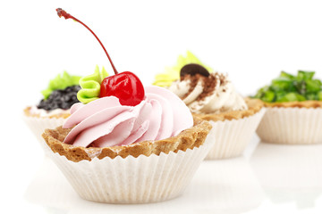 cake with cherry, kiwi fruit, currants and coffee