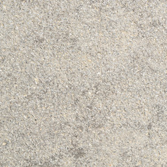 Concrete wall covered with pebbles