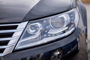 Fototapeta na wymiar Detail of a modern car. Head light
