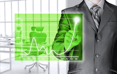 Business man touching light of idea