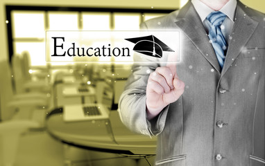 business man pointing 'education' concept