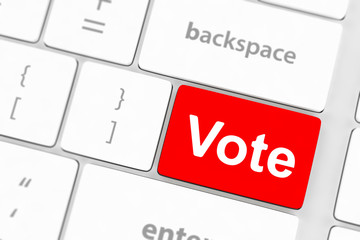 Fototapeta premium vote button on computer keyboard showing internet concept