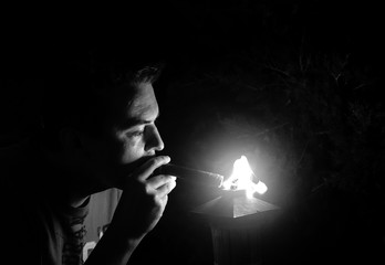 Man getting a light from cigar
