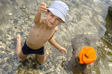 Beautiful kid playing as explorer