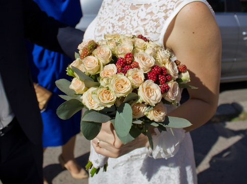 Bride holding wedding flower with blackberry bouquet