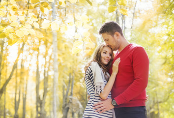 lovely couple in autumn park