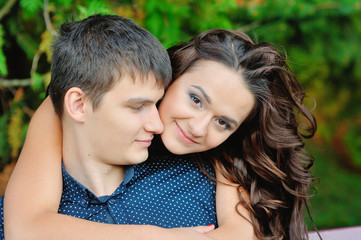 Fototapeta premium Young happy smiling attractive couple together outdoors