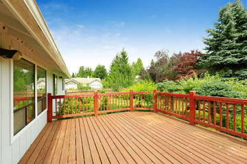 Spacious walkout deck with railings