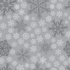Christmas seamless pattern of snowflakes in gray