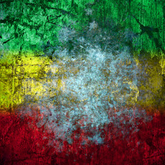 Red, yellow, green rasta flag on Concrete wall