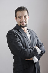 Adult man portrait with goatee posing in studio shot