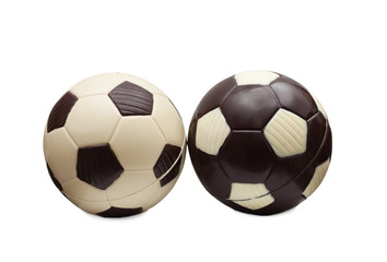 Soccer balls made ​​of white and milk chocolate