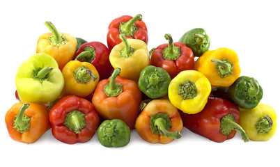 Pile of colorful peppers isolated