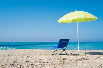 Beach umbrella and lounge chair