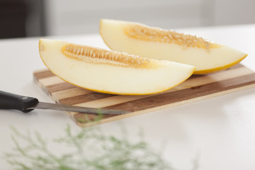 Melon on cutting board
