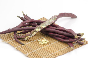 Fresh yardlong red bean and green bean on a white background