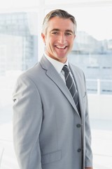 Businessman smiling at the camera