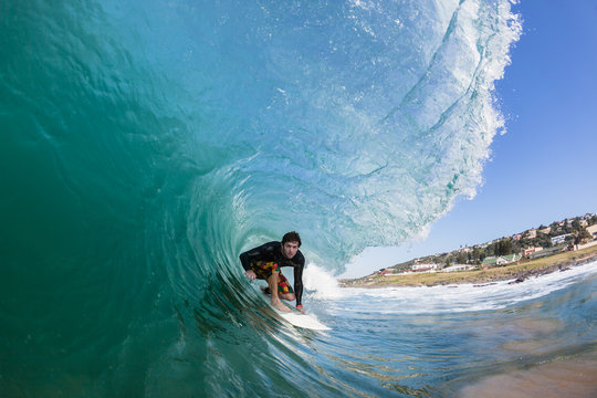 Surfing Inside Crashing Wave