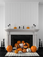 White fireplace decorated with pumpkins for Halloween
