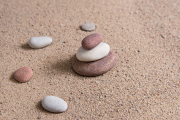 Fototapeta na wymiar zen garden sand waves and rock sculptures